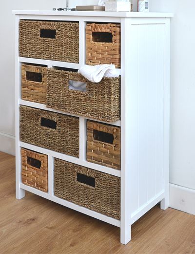 White cabinet with 8 storage baskets